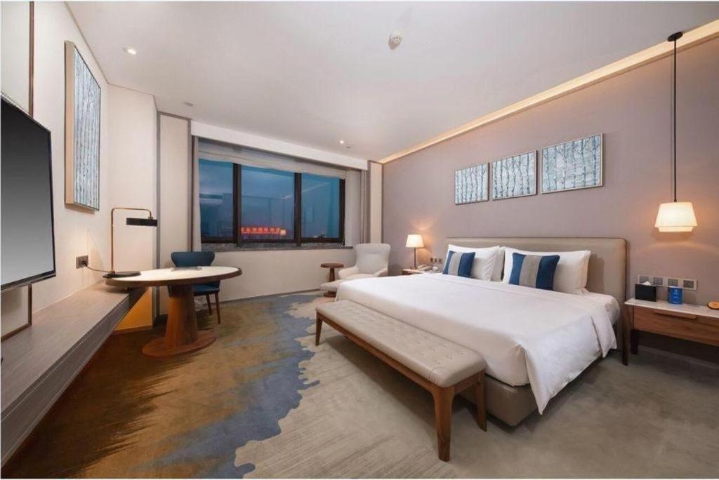 Rosedale Hotel Taicang Bagian luar foto